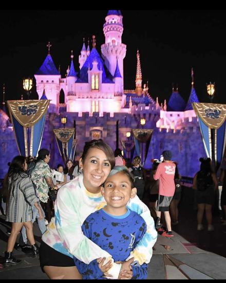 A photo of Gladys Guevara with her son at Disney Land.