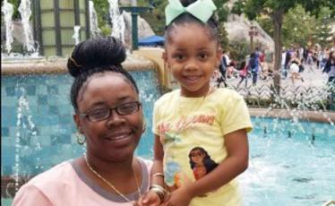 A photo of LaToya Scott with her daughter.