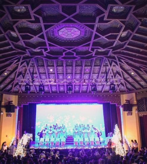 Nursing graduates assemble onstage in SBVC’s historic Auditorium.