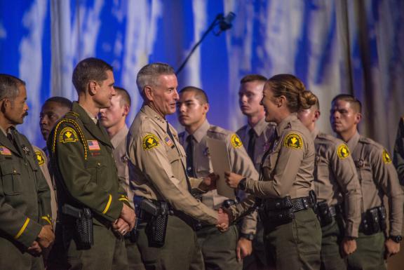 Graduates were congratulated by fellow officers and San Bernardino County Sheriff John McMahon. 
