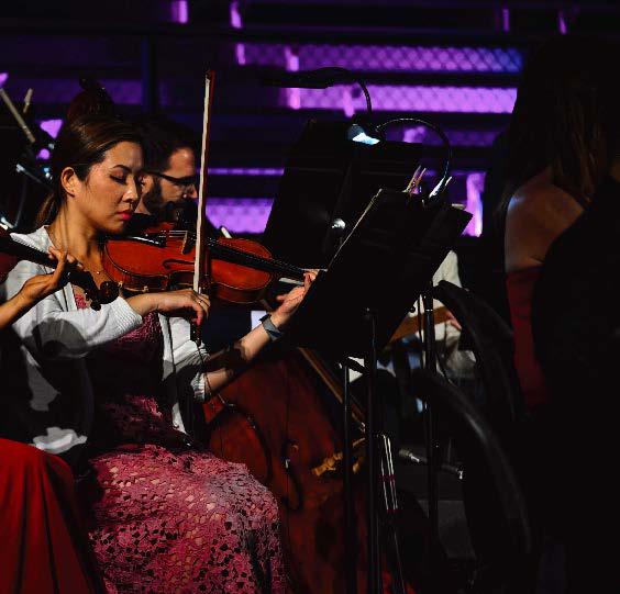 A photo of a woman playing violin at Summerfest
