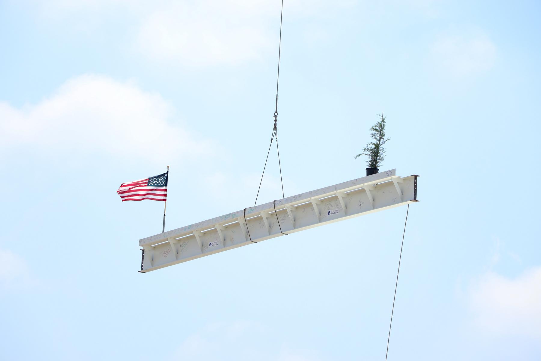 The final beam being lifted into place