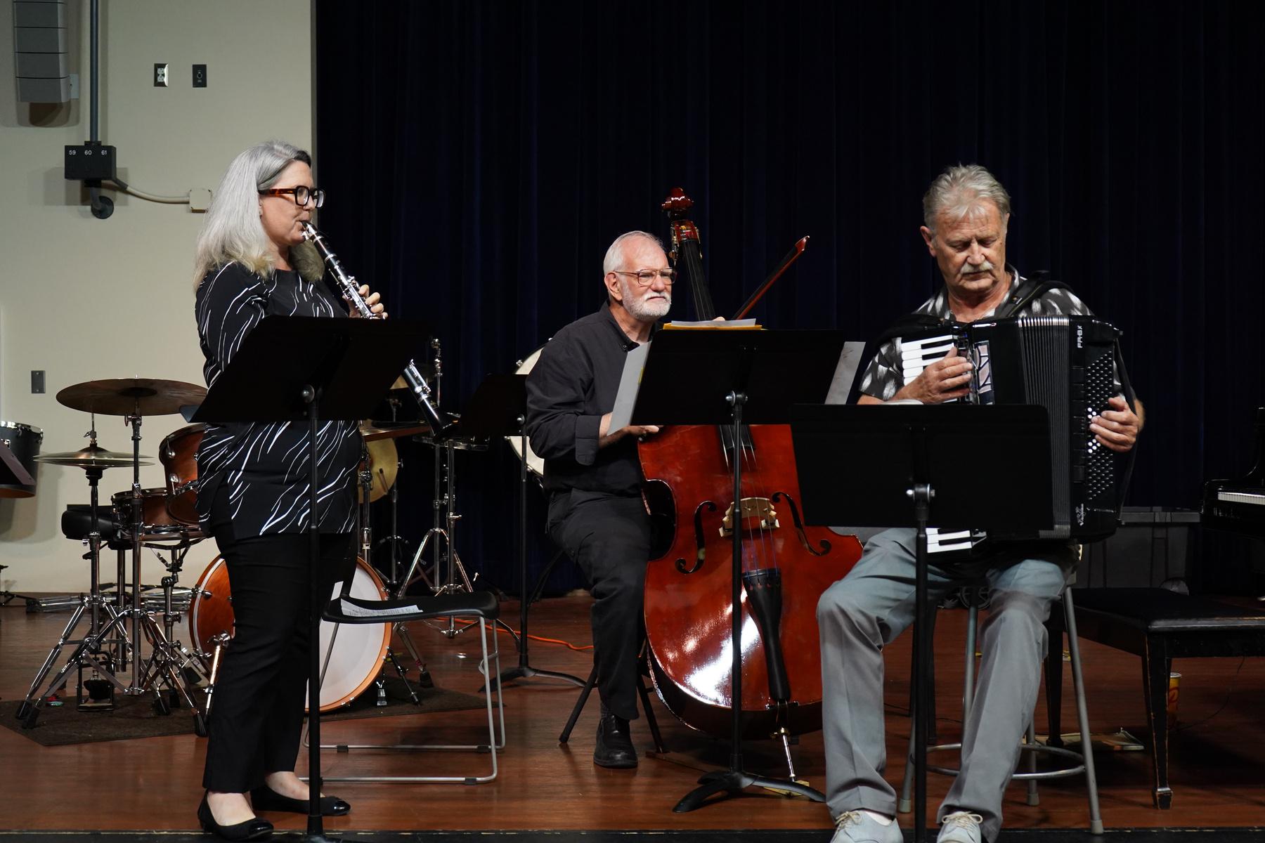 Left to right: Margaret Worsley on clarinet, Dr. Robert Berry on bass viola, and Alex Lavruk on accordion