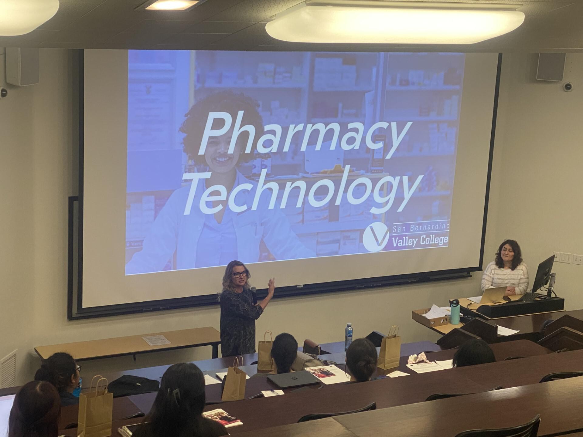 Robyn Seraj presenting information about Pharmacy Technology in front of students