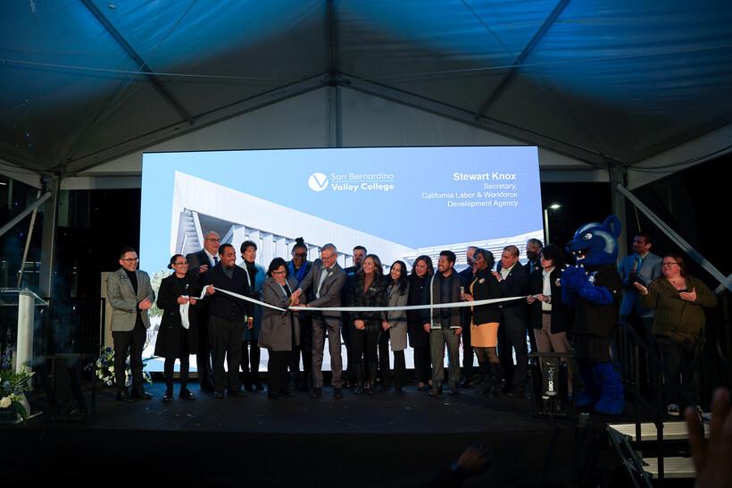 SBVC administrators on stage cutting the ribon and officially opening the applied tech building.