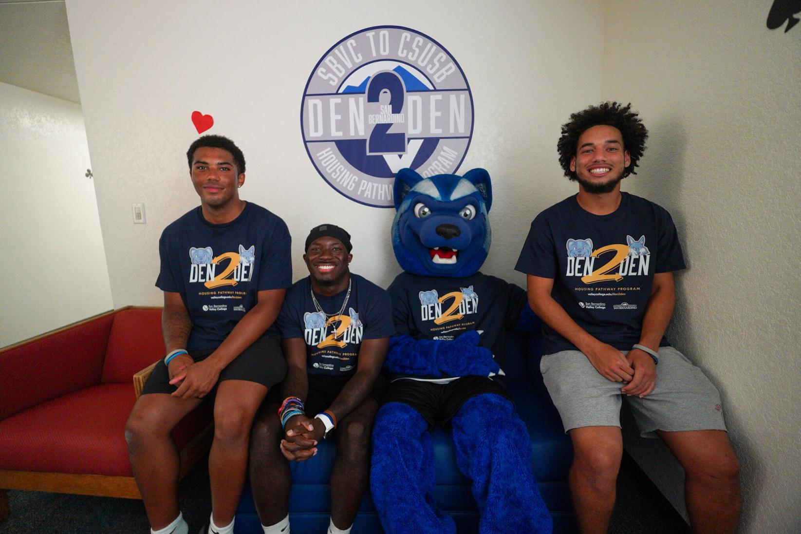 Students in the Den2Den program sitting with Blue