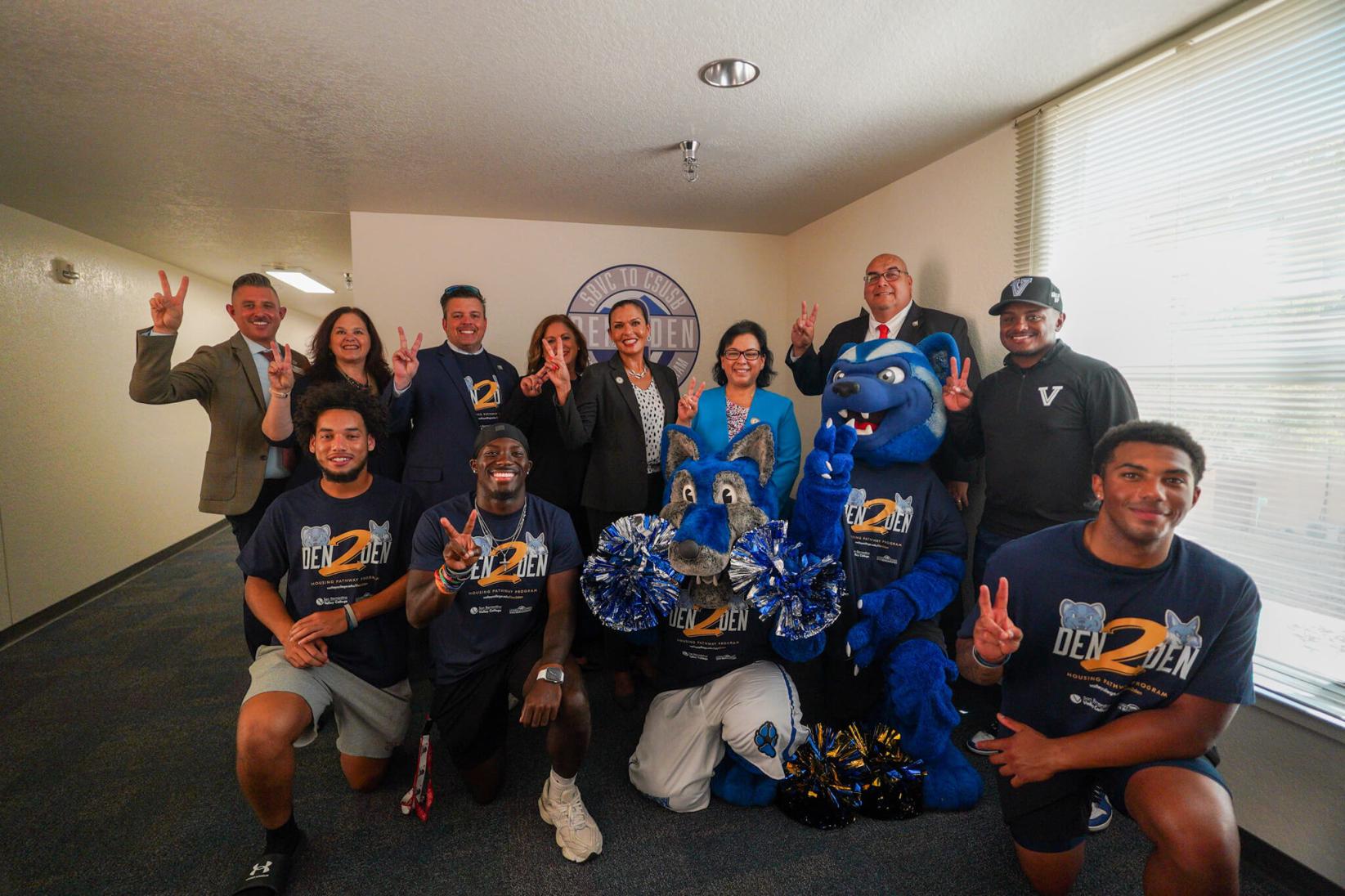 Students, Blue and SBVC administrators posing in a group shot