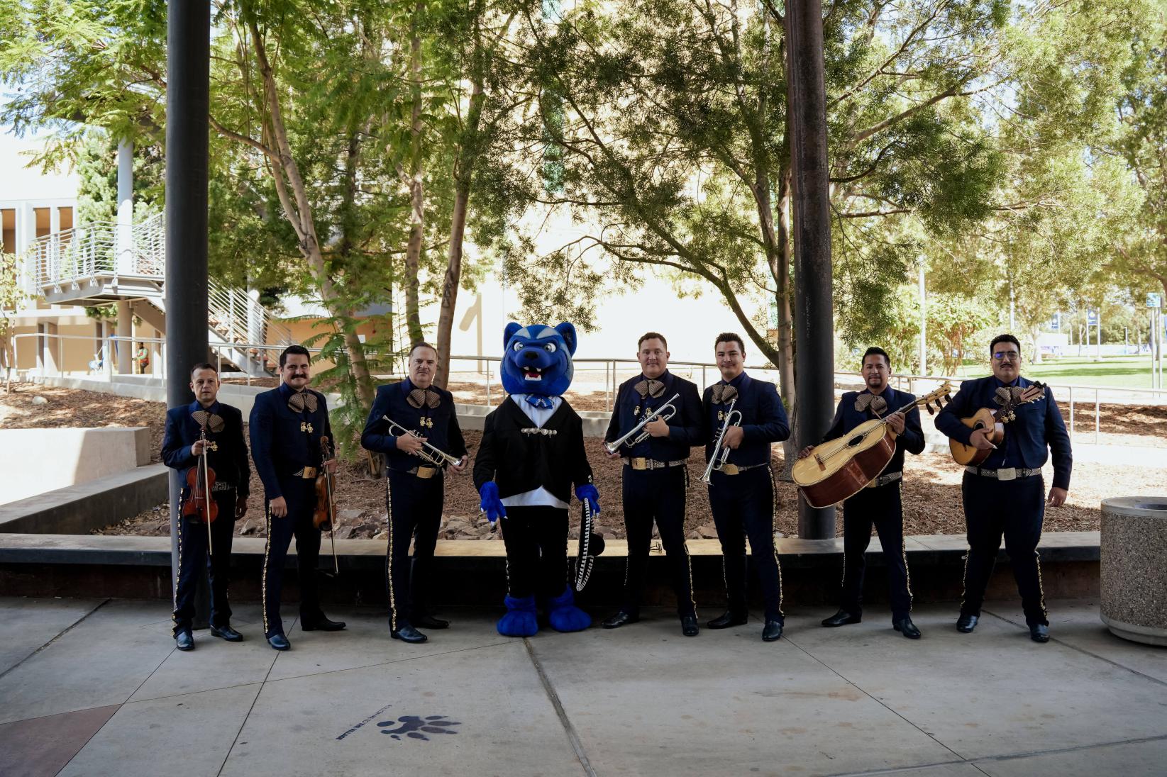 Blue with a group of Mariachis