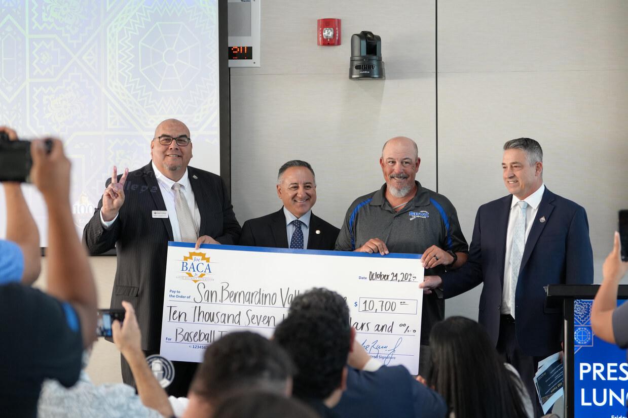 SBVC President and Executive director of the SBVC Foundation with a large 10k check