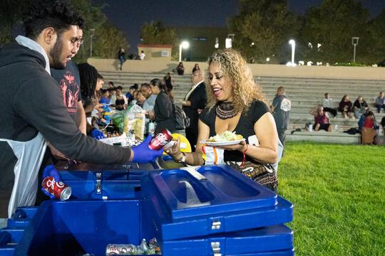 Fry bread tacos being handed out