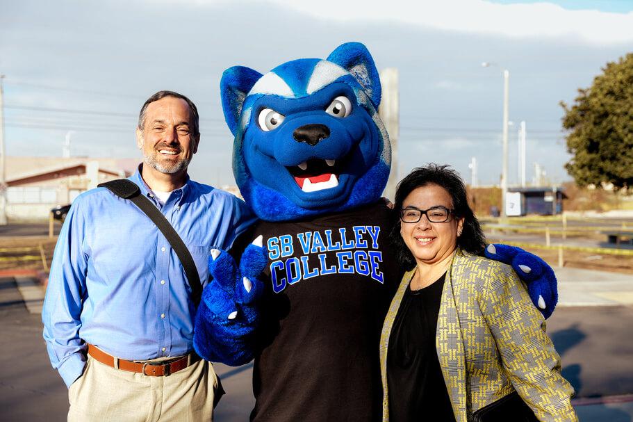 Blue posing with SBVC administrators
