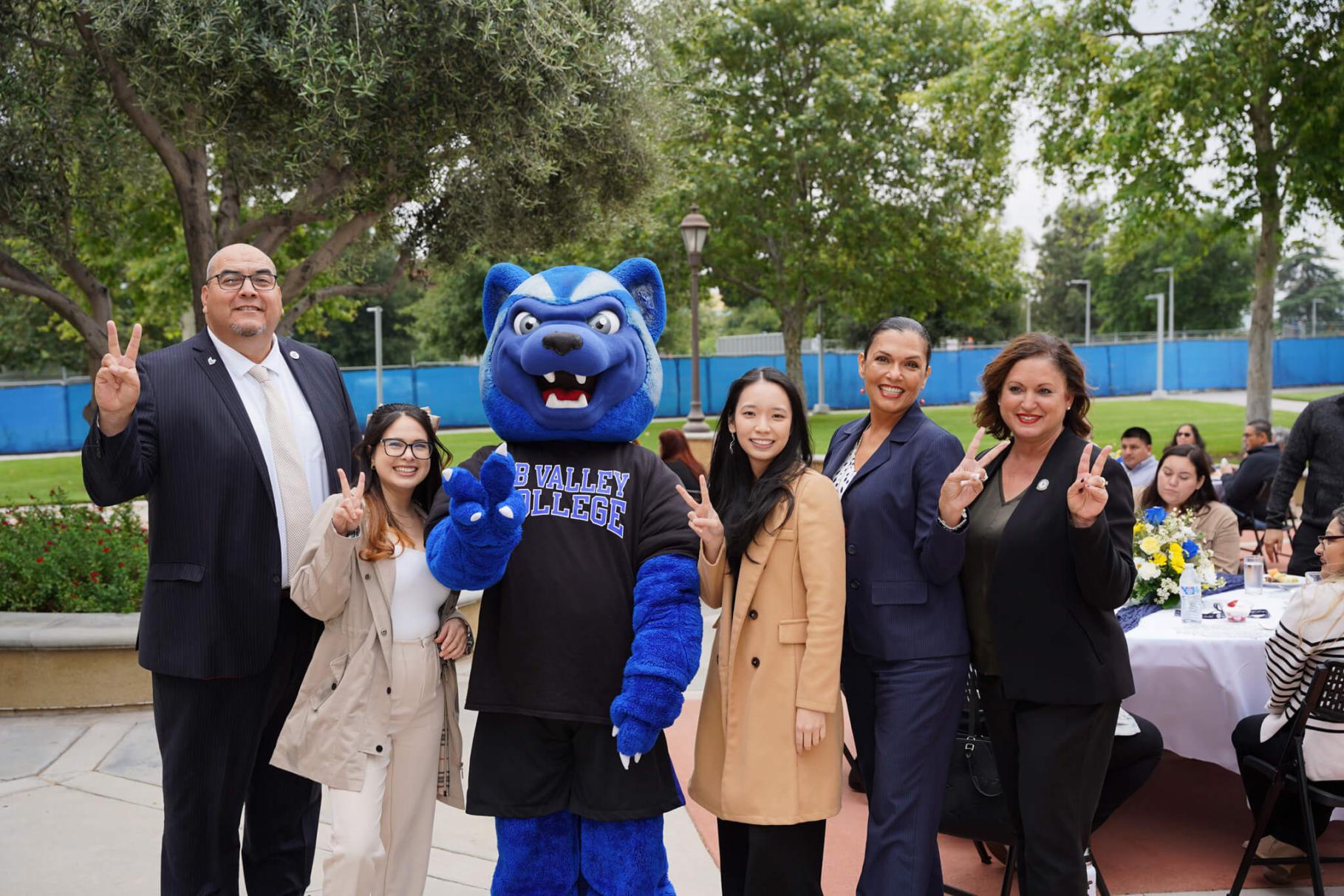 A group photo with blue