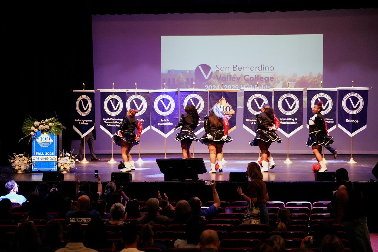 SBVC cheerleaders on stage in the Auditorium
