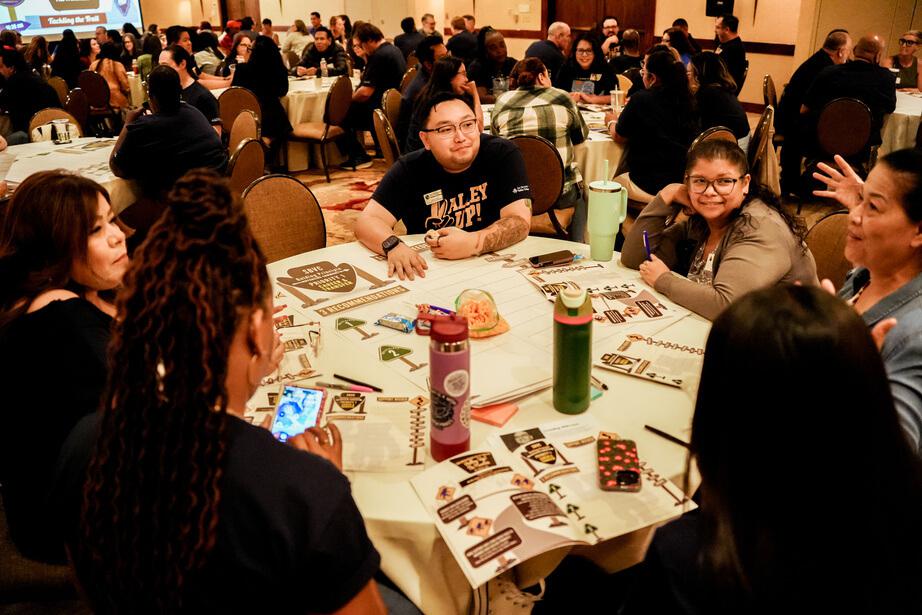 A group of faculty & staff talking 