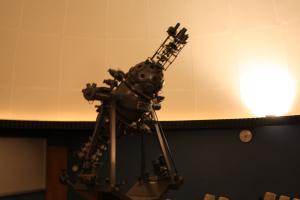 star projector inside planetarium